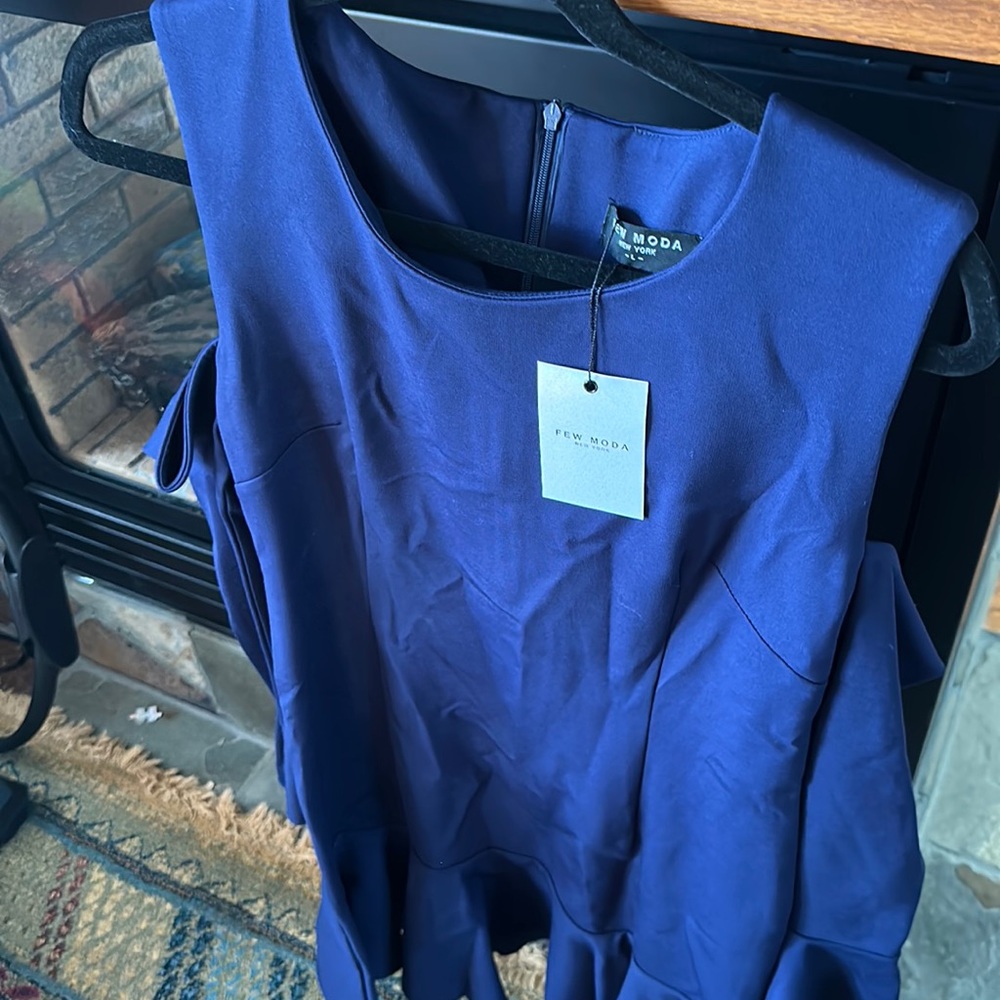 Few Moda size large Dress fit and flare blue with unique arm sleeves